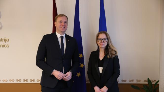 V.Valainis un M.Smita