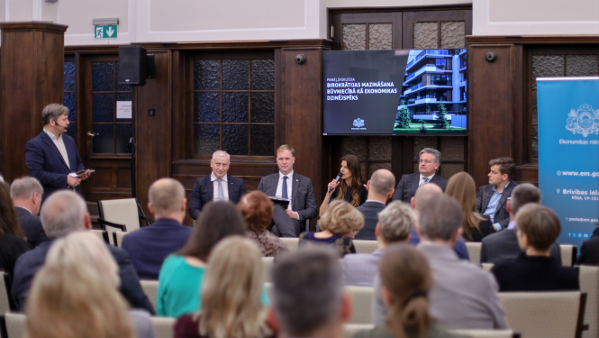 Fotogrāfija no konferences