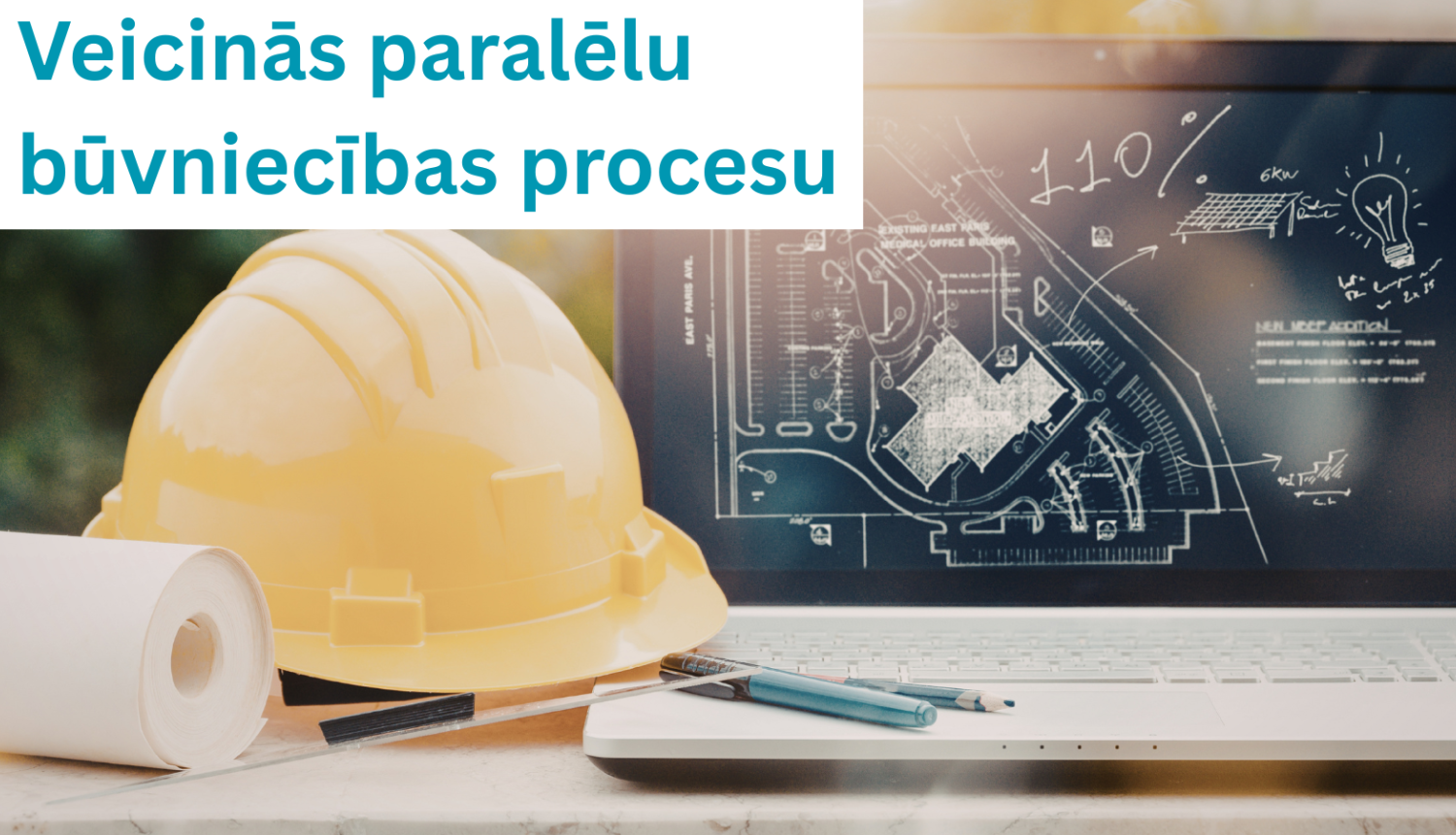 Dators ar projektu un ķivere pie tā